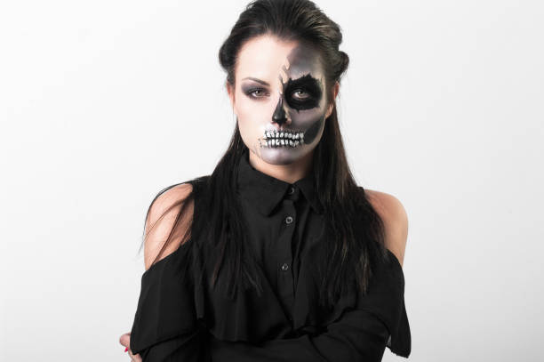 istock Beautiful woman with make-up skeleton 951038342