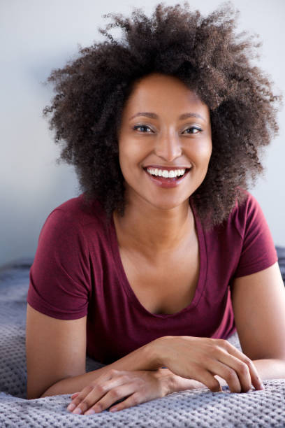 istock Close up beautiful smiling young african woman 951045140