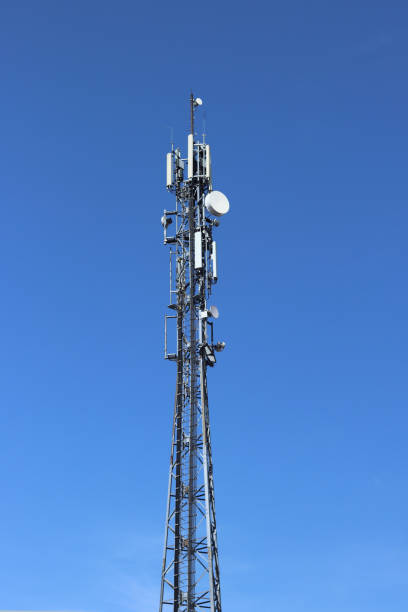 istock Radio tower with antennas on a blue sky background. 951054070