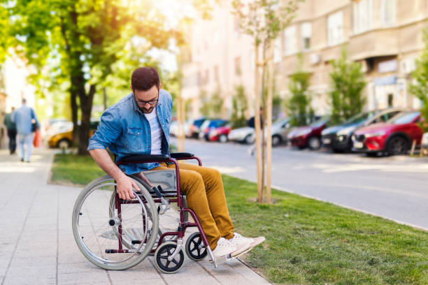 istock Handicapped man in a wheelchair 951055588