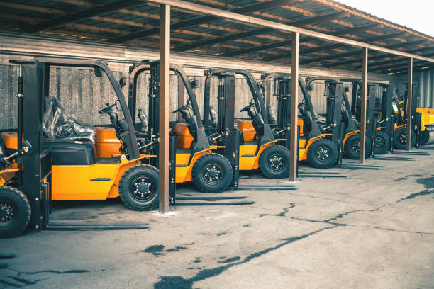 Background of a lot of forklifts, reliable heavy loader, truck Background of a lot of forklifts, reliable heavy loader, truck. Heavy duty equipment, forklift forklift photos stock pictures, royalty-free photos & images