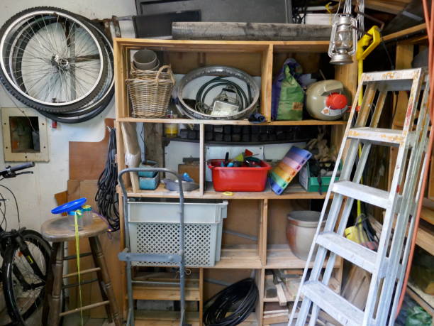 istock Messy storeroom, ladder, tools and many other items in a messy storeroom 951056800