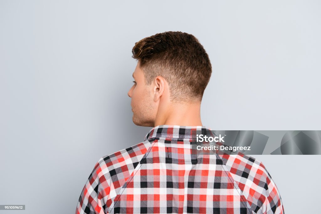 Back View Of Young Guy In Chekered Shirt On Gray Background Stock Photo -  Download Image Now - iStock