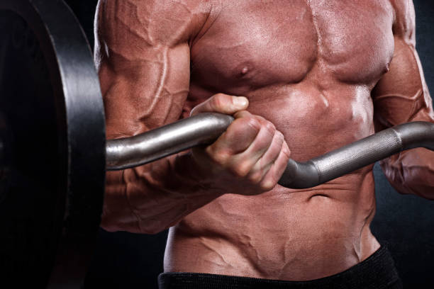 istock Fitness athele with barbell 951060664