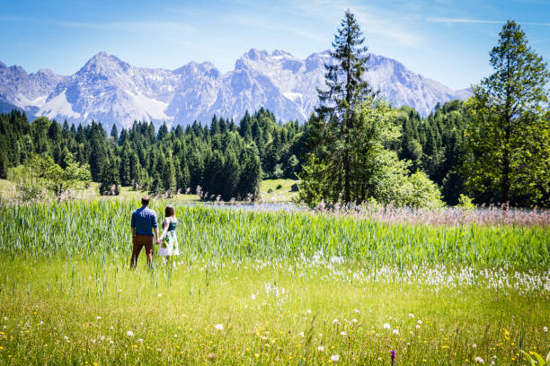istock happy lovers on Holiday in the alps mountains 951061700