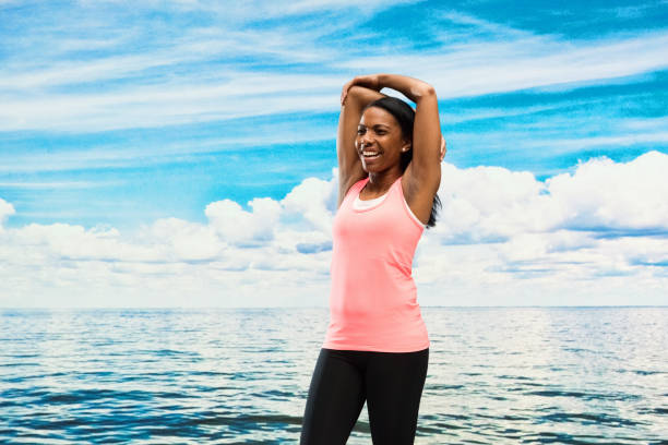 istock Beautiful woman by the lake 951064488