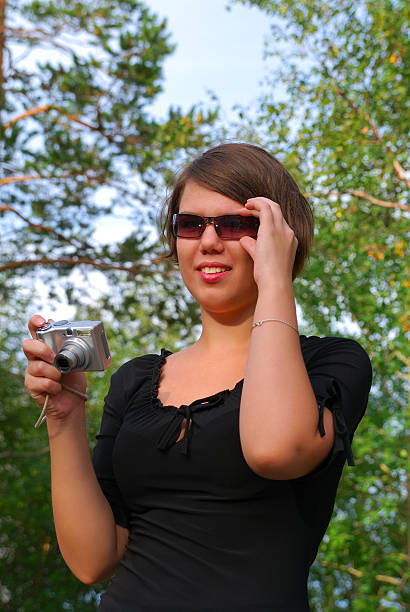 istock girl with the camera 95106512