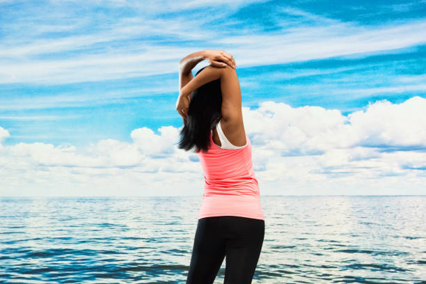 istock Beautiful woman by the lake 951068018