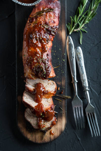 istock Baked pork tenderloin with barbecue sauce 951069620