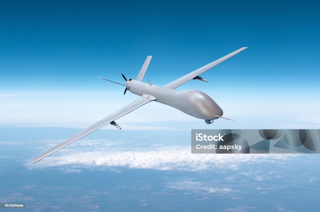 Unmanned military drone on patrol air territory at high altitude. Unmanned military drone on patrol air territory at high altitude Drone Stock Photo