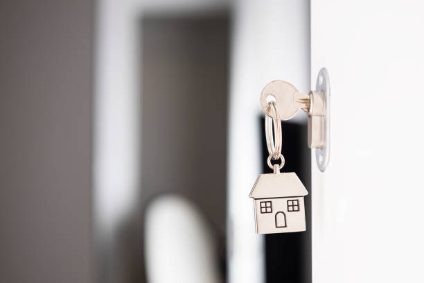 istock House key in the door 951070826