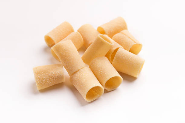 istock Pile of raw paccheri on white background 951072280