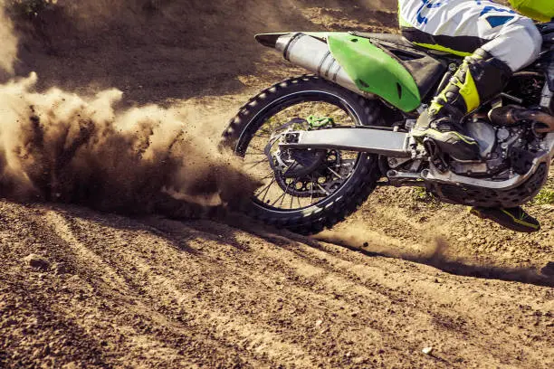 Close-up of motocross wheel. Professional dirt bike rider