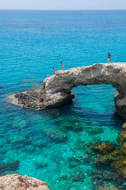 Ayia Napa, Cyprus - April 19, 2018: Tourists are exploring beautiful lagoon in Cyprus, Ayia Napa