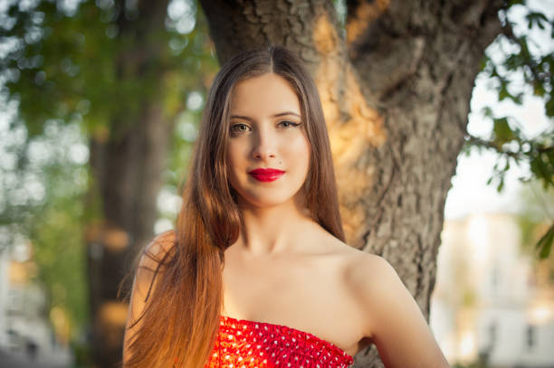 Portrait of the girl in a red dress.