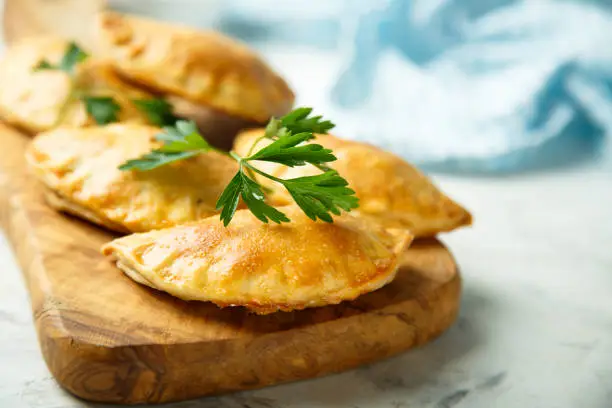 Homemade hand pies with beef and olives