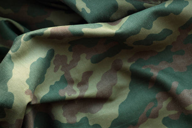 Military uniform pattern. Military uniform pattern. Abstract background and texture. camouflage clothing photos stock pictures, royalty-free photos & images