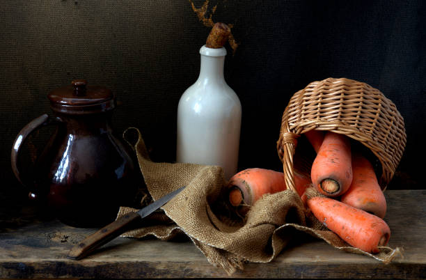 istock fresh carrot at basket, rustical still life 951096924