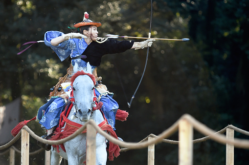 Yabusame is the traditional Japanese horseback archery, and today some shrine in Japan will invites the archers to perform it for their important festival.
The female archer demonstrates Takeda-Ryu (school) of horseback archery in the back yard of Meiji Shrine on Nov. 03, 2017. (Tokyo, Japan)