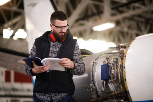 istock Aircraft mechanic in the hangar 951098338