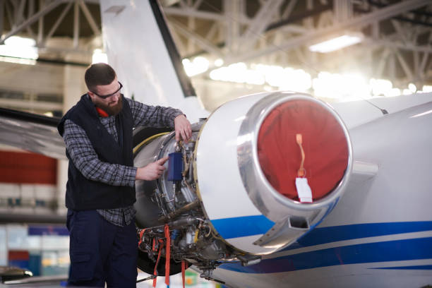 istock Aircraft mechanic in the hangar 951100478