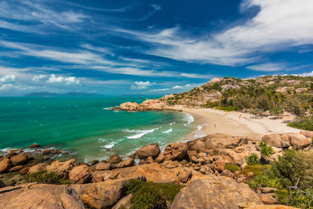 istock Horseshoe Bay at Bowen - iconic beach with granite climbing rocks, Australia 951101604