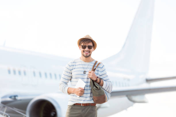 istock Good looking guy standing at airport 951104392