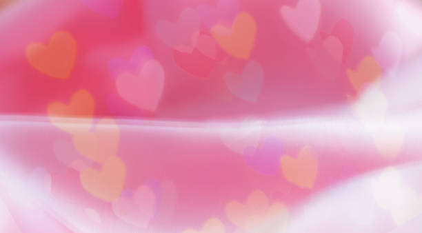 istock Abstract pink fabric, canvas with heart bokeh texture background. 951104626