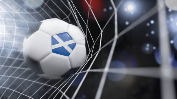 Realistic soccer ball in the net with the flag of Scotland.(3D illustration series) Very realistic rendering of a soccer ball with the flag of Scotland in the net.(3D illustration series) scotland football team stock pictures, royalty-free photos & images