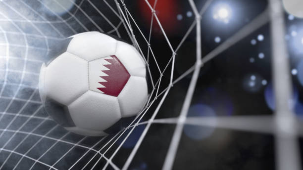 realistische voetbal bal in het net met de vlag van qatar. (3d illustratie serie) - qatar football stockfoto's en -beelden
