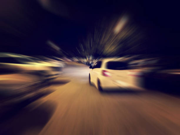 istock Abstract blur outdoor car parking at night 951113360