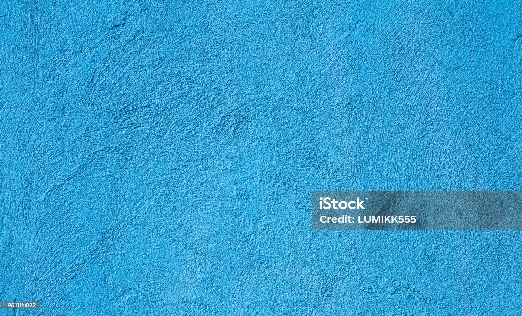 Abstract Grunge Decorative Blue Stucco Texture Abstract Grunge Decorative Light Blue Cyan Painted Stucco Wall Texture. Rough Winter Christmas Paper Background With Copy Space Blue Stock Photo