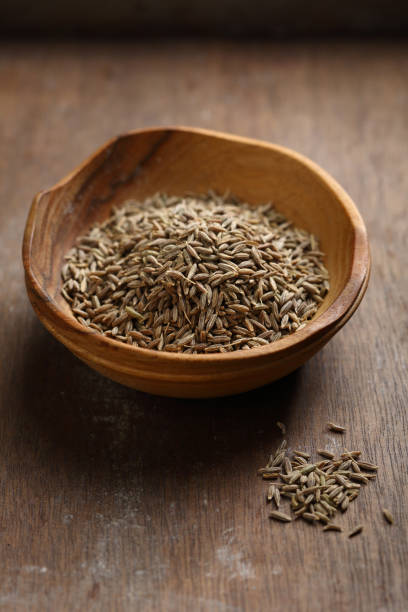 istock Cumin seeds in small bowl, food closeup 951121576