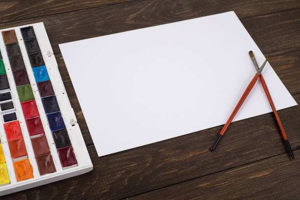 istock Paints, pencils and brushes on wooden to a floor. Image preprocessing 951126696