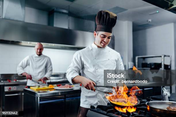 Mastering New Culinary Heights Stock Photo - Download Image Now - Chef, Cooking, Restaurant