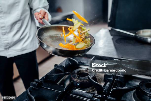 Flipping Some Veggies Stock Photo - Download Image Now - Chef, Cooking, Food
