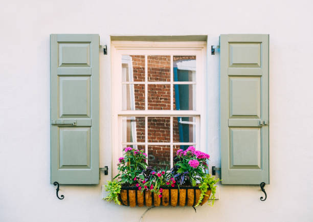 istock Windows with Shutters Open in Historic Building Charleston South Carolina 951132802