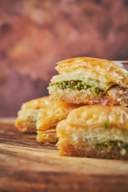 istock Baklava and espresso coffee on a board of mango wood 951135964