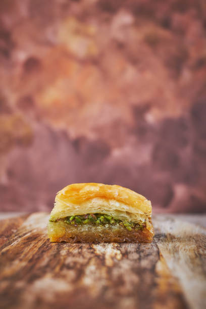 istock Baklava and espresso coffee on a board of mango wood 951136008