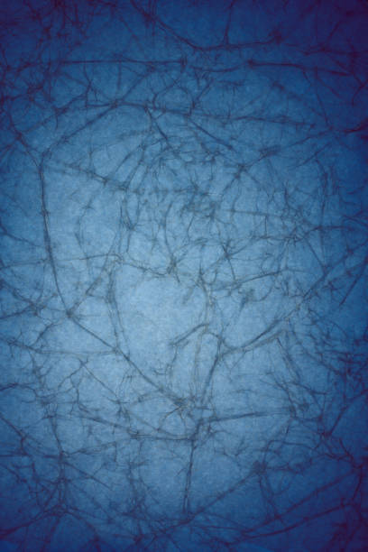 istock vintage blue paper texture with crease 951136828