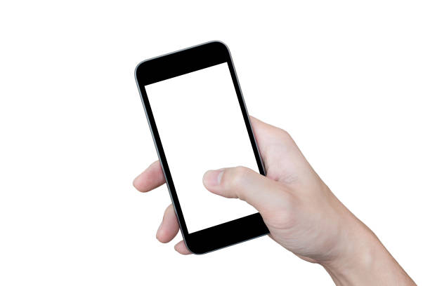 Hand holding black smartphone with blank screen isolated on white background.