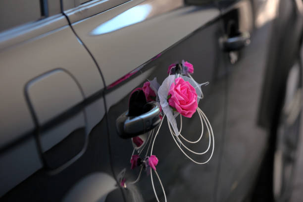 istock Decoration flowers at the car before wedding ceremony 951137850