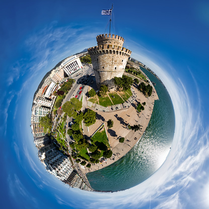 Little planet panorama of the famous white tower in the city of Thessaloniki in northern Greece