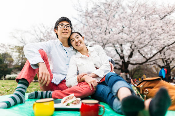 istock Couple enjoying cherry blossom in Spring 951147736