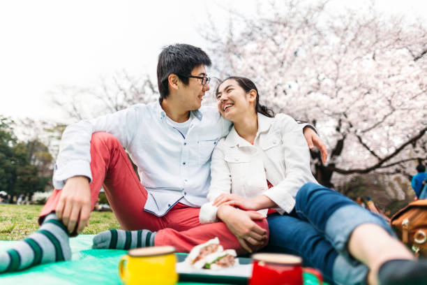 istock Couple enjoying cherry blossom in Spring 951147756