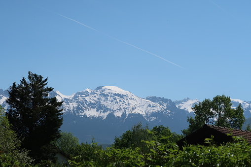 Meylan, France – April 21, 2018: photography showing the Alps mountain. The photography was taken from the town of Meylan, near Grenoble, France.