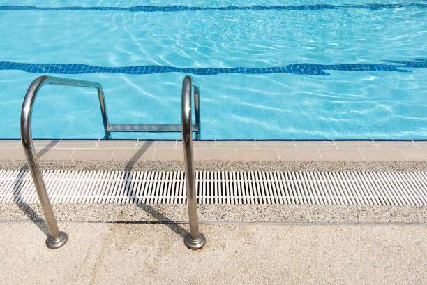 istock Swimming pool with stair at hotel close up. 951151304