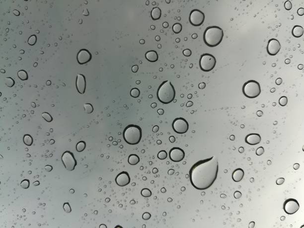 istock water drops from the rain on the car mirror 951154160