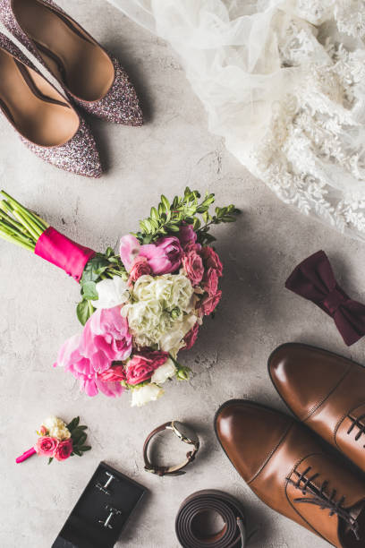 istock top view of wedding accessories and bouquet on gray surface 951154286