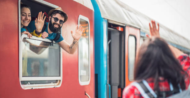 istock Three friends meeting at the railway station 951154458
